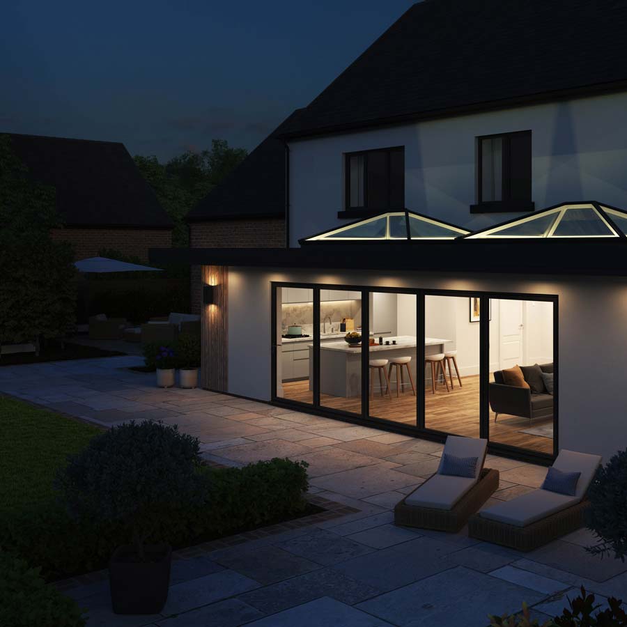 night time view of two aluminium roof lanterns